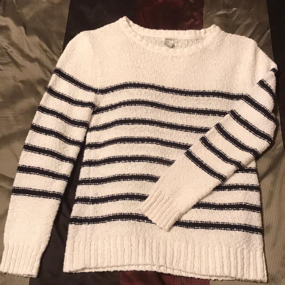 Blue and white striped sweater